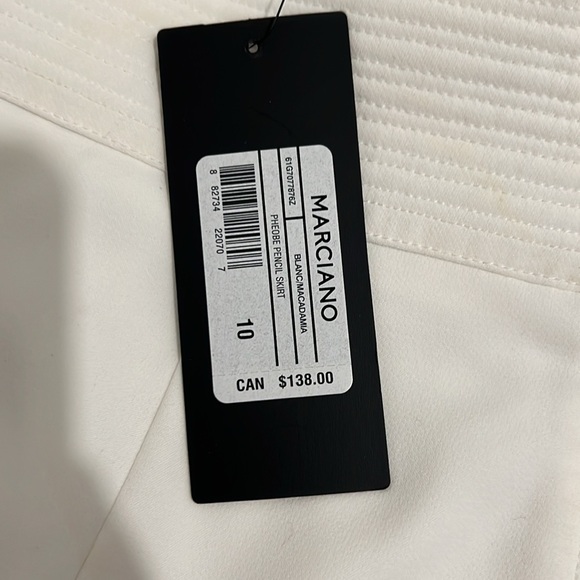 Marciano ivory white pencil skirt with a gold zipper on the back. - Picture 3 of 4